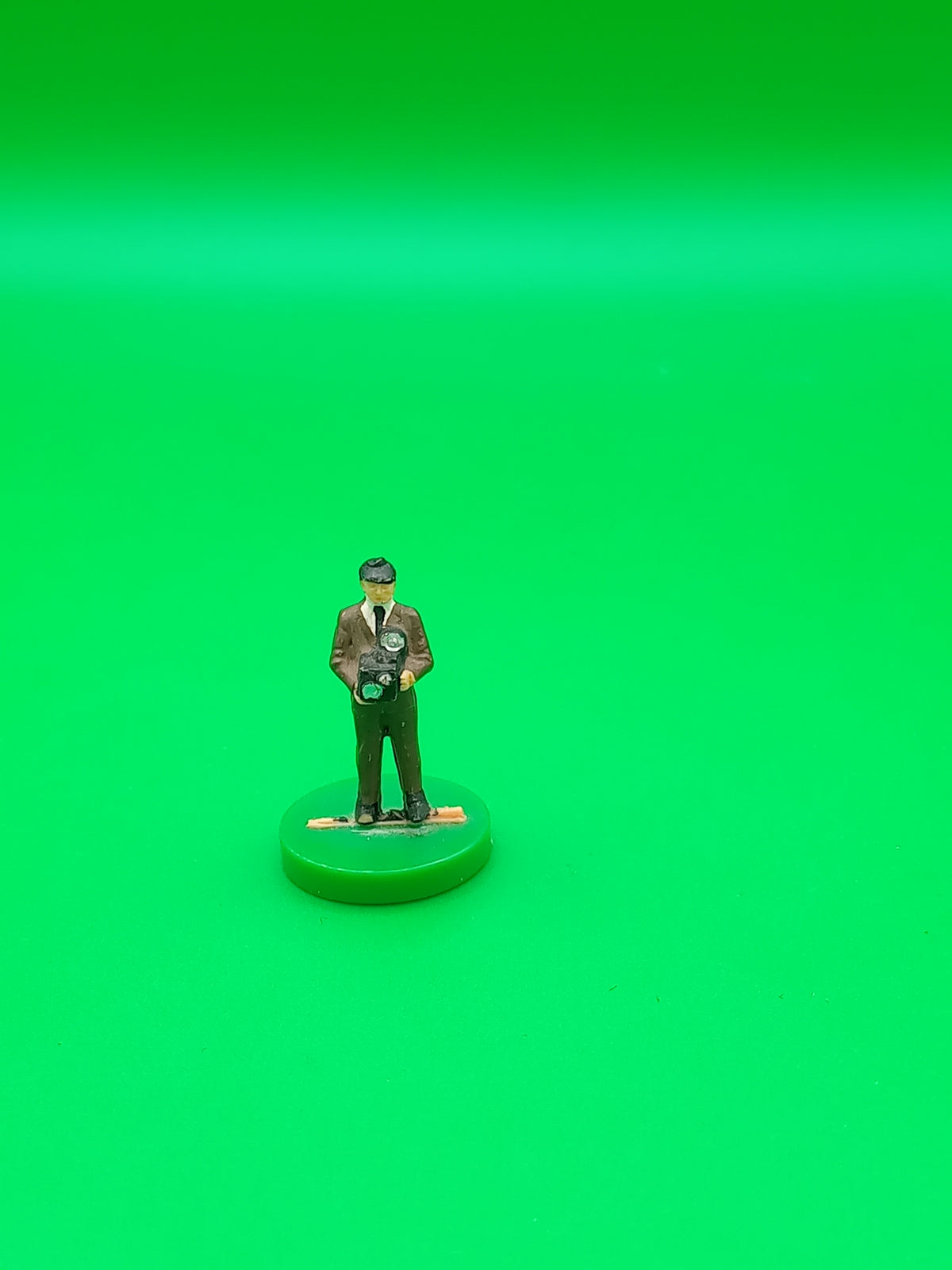 Subbuteo personaggio stadio Fotografo base larga verde