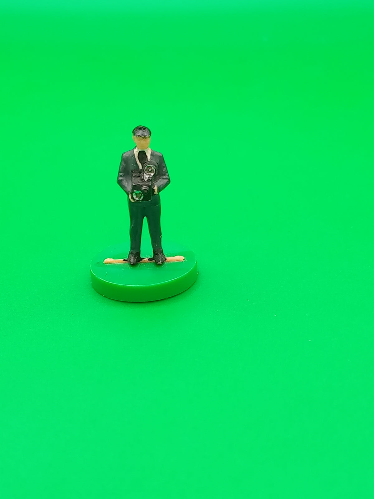 Subbuteo personaggio stadio Fotografo base larga verde